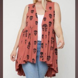 Rust Rust  Rust        Sleeveless cardigan featuring a long flattering silhouet